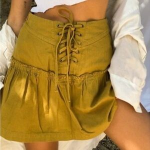 Size 10, free people, mini skirt. No flaws. Zipper enclosure.